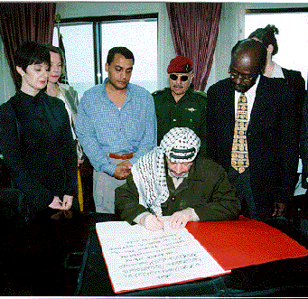 Arafat signs